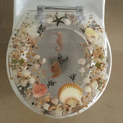 Daniels Bath Sea Treasure Decorative Round Toilet Seat Color: Clear UYG7_Z3NYT23