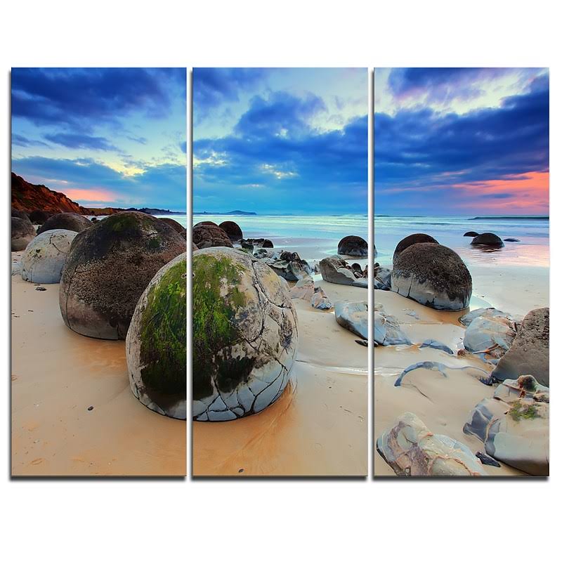 Design Art Cloudy Sunrise Over Moeraki Boulders - 3 Piece Graphic Art on Wrapped Canvas Set, Blue KYZ2_M5LPU13